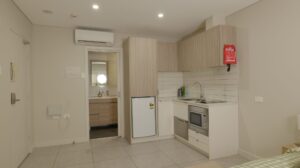 Leumeah SIL housing - kitchenette and ensuite entry